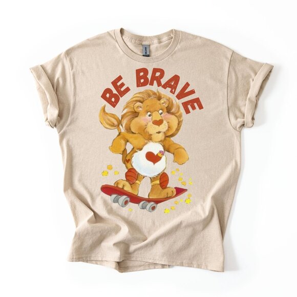 Gildan Tops - Care Bears Cousins Brave Heart Lion Skateboard Women's Graphic Print 80s T-Shirt